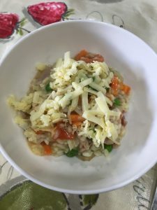 Buzymum - Finished bacon and monkfish risotto sprinkled with cheese