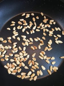 Buzymum - Pinenuts toasting in a frying pan