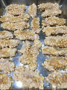 Buzymum - Pop Chicken Nuggets drizzled with butter, ready for the oven