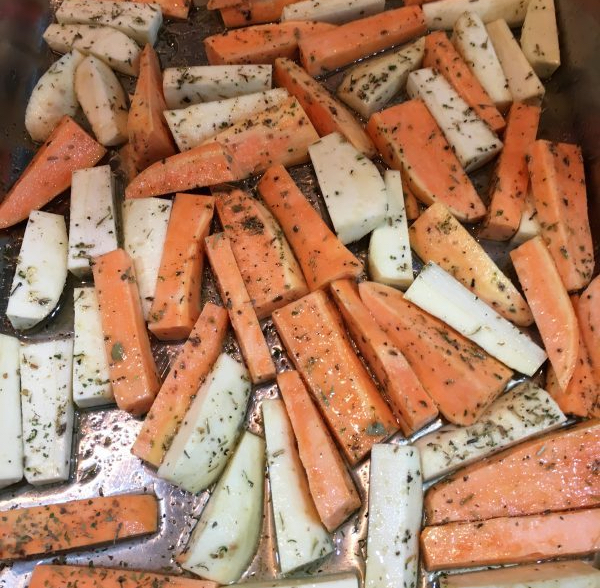 Buzymum - Root veg coated in oil and herbs ready for roasting