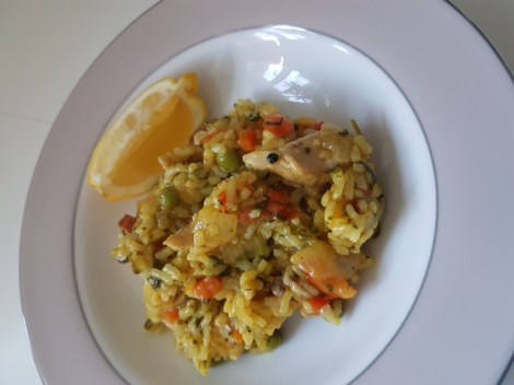 Buzymum - Chicken and chorizo paella served with a wedge of lemon