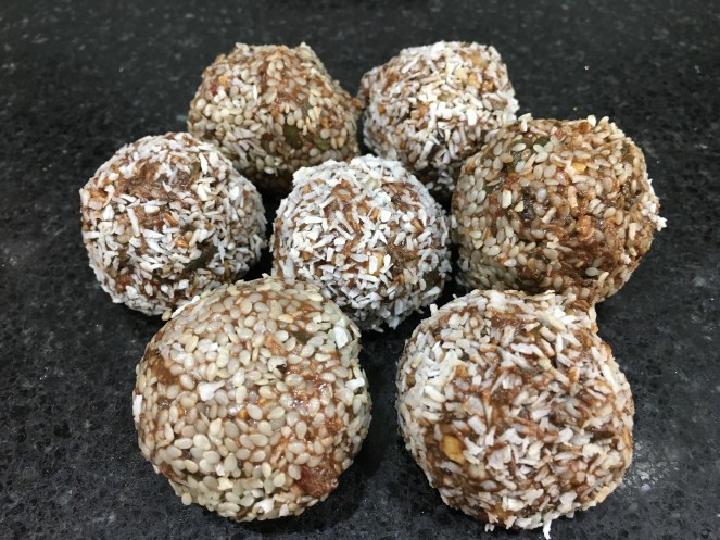 Buzymum - peanut butter energy balls rolled in coconut and sesame seeds