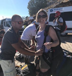 Buzymum - Getting strapped into the harness ready to fly!